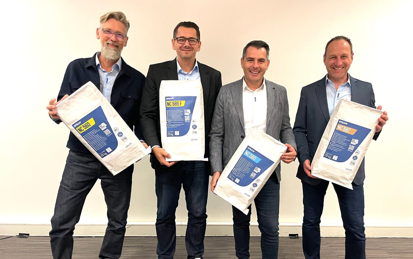 Die Uzin Veranwortlichen mit den neuen FusionTec Produkten. Alle Fotos: Redaktion