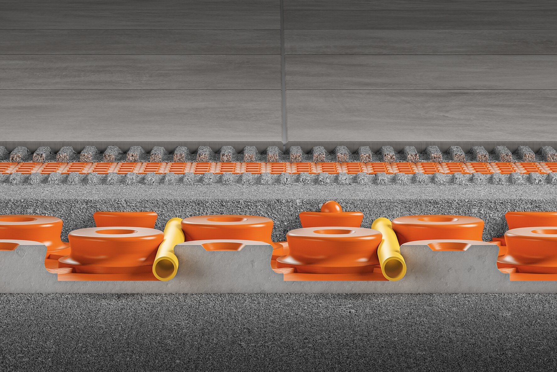 Schlüter-Bekotec-Therm: effiziente Kombination aus Estrichnoppenplatte, Heizrohren und Estrich für eine sichere und energiesparende Fußbodenheizung.